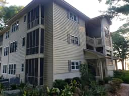 Renovated King Bed Condo near beach with pool access.