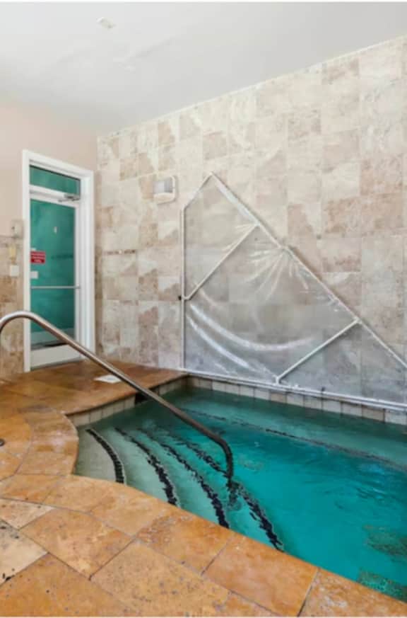 Renovated King Bed Condo near beach with pool access.
